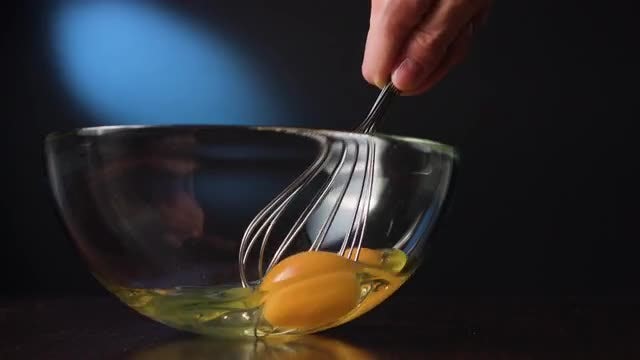 Whisking Eggs In Glass Bowl : Stock Video