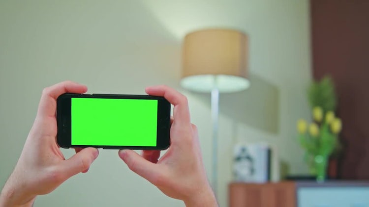 Holding Green Screen Phone Horizontally : Stock Video