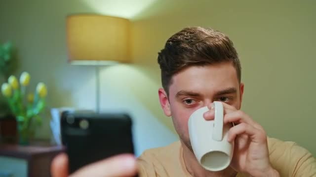 Angry While Watching From Phone: Stock Video