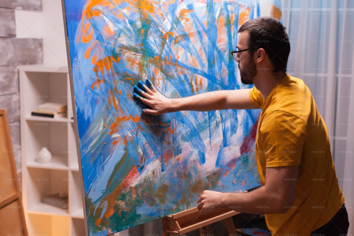Painting With His Hands: Stock Photos