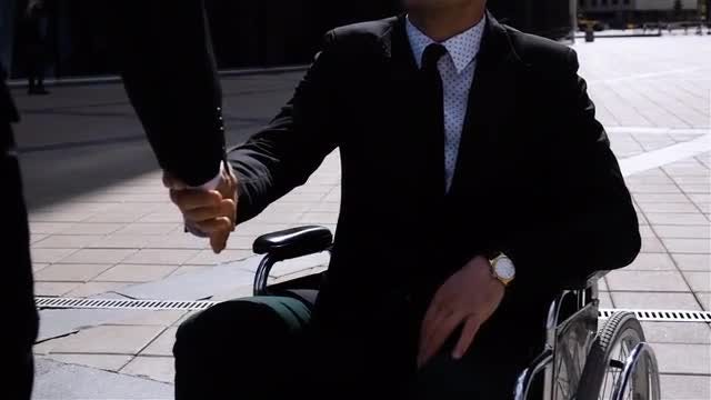 Shaking Hands, Deal With PWD: Stock Video
