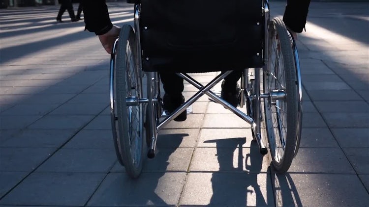 Back View Of Determined PWD: Stock Video
