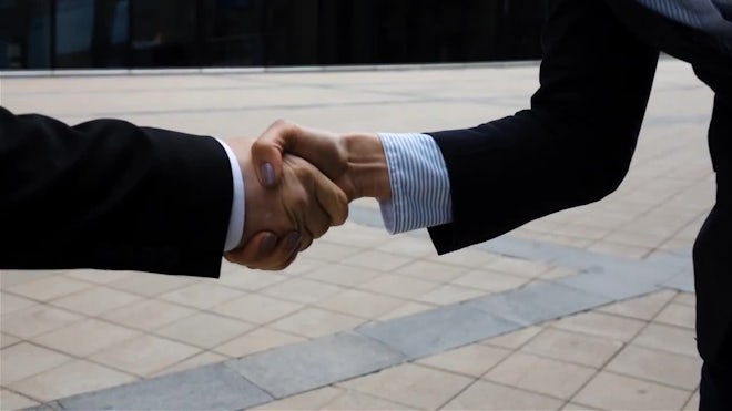 business partners shaking hands