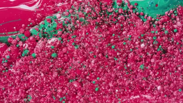 Red-Green Tiny Bubble Cascade: Stock Video