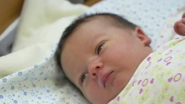 Newborn Baby Waking Up: Stock Video