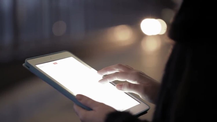 Woman using touchpad in the underground: Stock Video