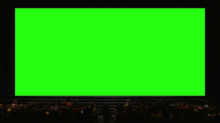 People In Auditorium With Green Screen: Stock Video