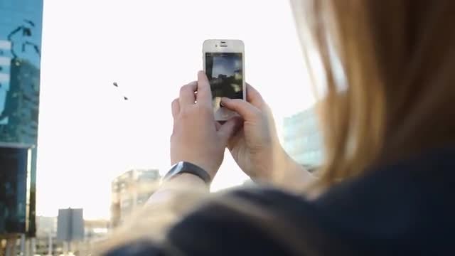 Woman Taking Photos Of City : Stock Video