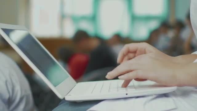 Typing Lecture Notes On Laptop: Stock Video