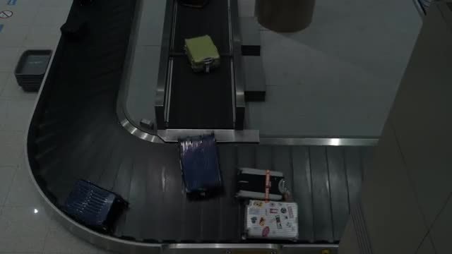 Luggage Arriving At Baggage Claim: Stock Video