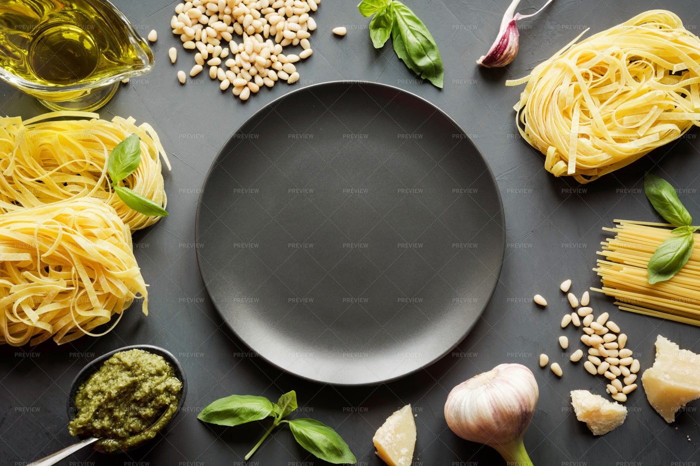 Raw Pasta Ingredients By The Plate: Stock Photos