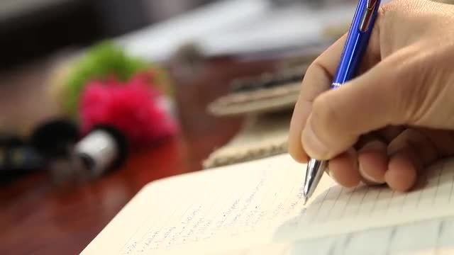 Jotting Down Notes : Stock Video