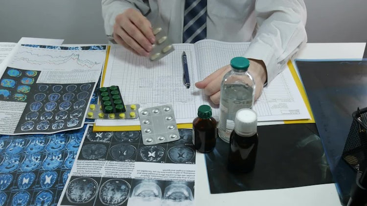 Male Doctor Prescribing Medicine: Stock Video