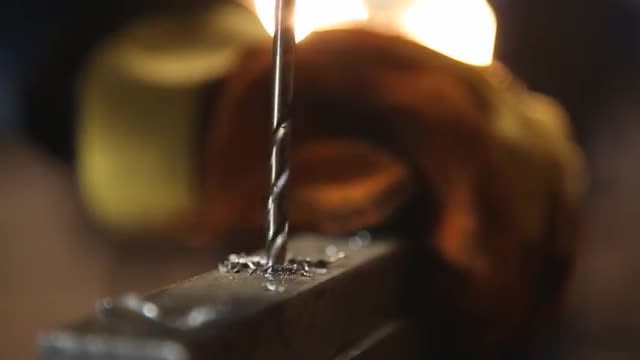 Drilling A Piece Of Metal: Stock Video