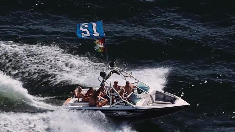 Football Fans Sailing On Power Boat : Stock Video
