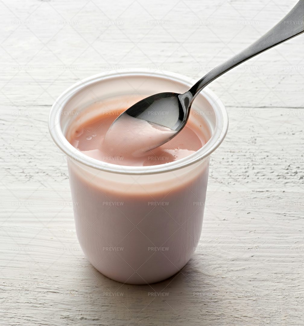Tub Of Fruit Yoghurt: Stock Photos