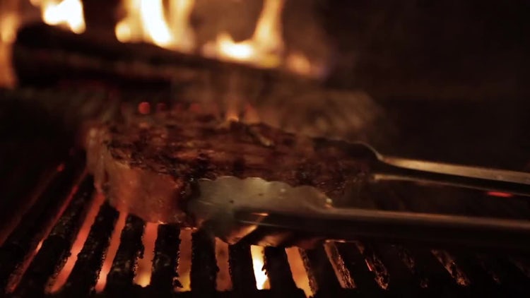 Burning Ribeye Steak On Grill: Stock Video