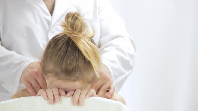 Young Woman Enjoying Relaxing Massage - Stock Video | Motion Array