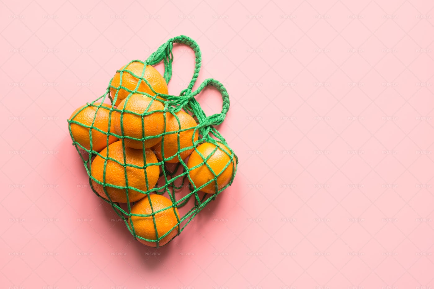 Mesh Shopping Bag Of Oranges: Stock Photos