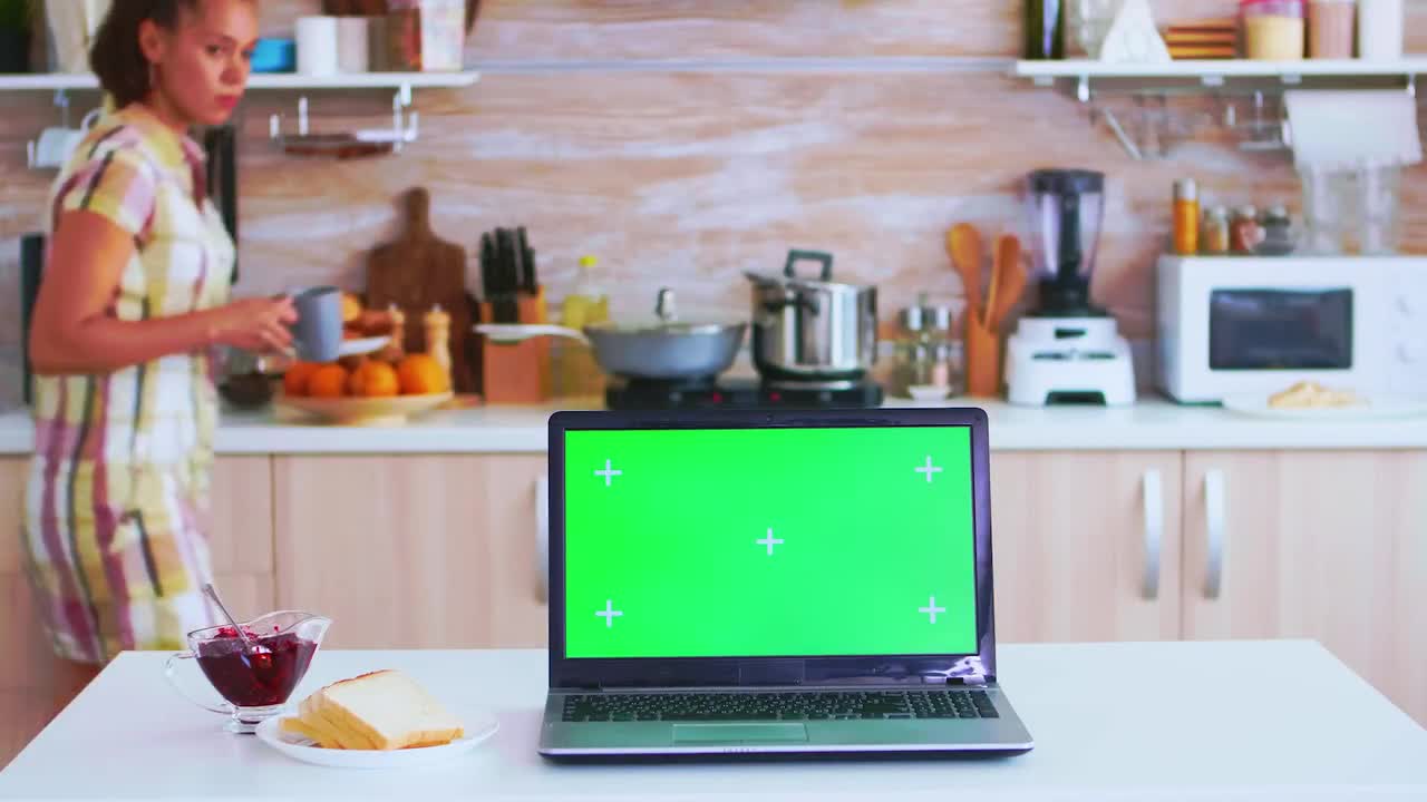 Laptop With Green Screen In Kitchen Stock Video Motion Array