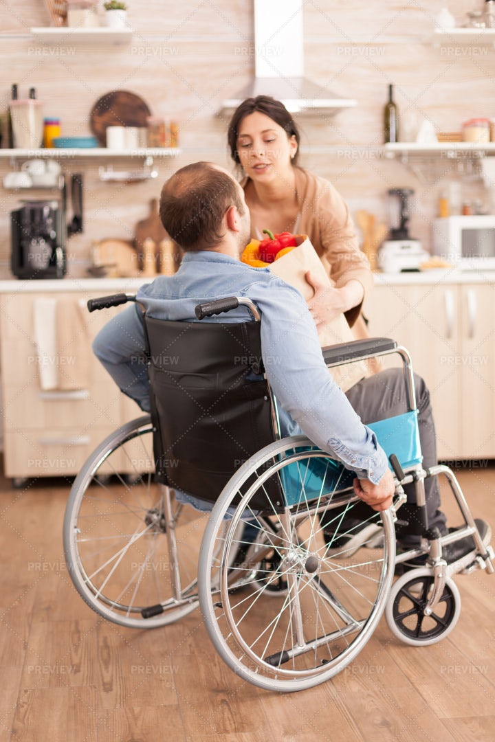 Handing Over His Groceries: Stock Photos