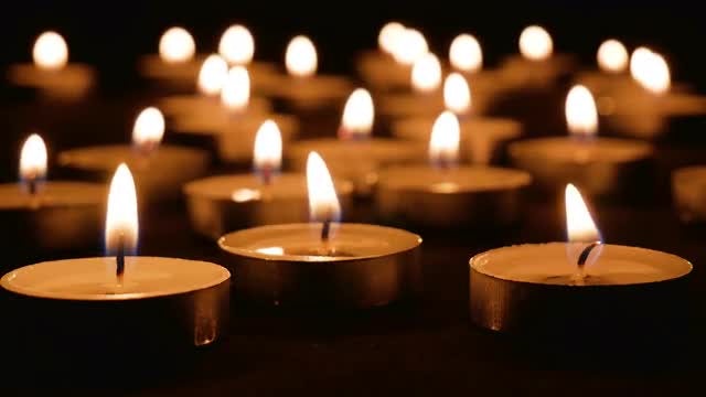 Candles Burning In Dark Room: Stock Video