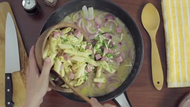 Cooking Pasta In Frying Pan: Stock Video