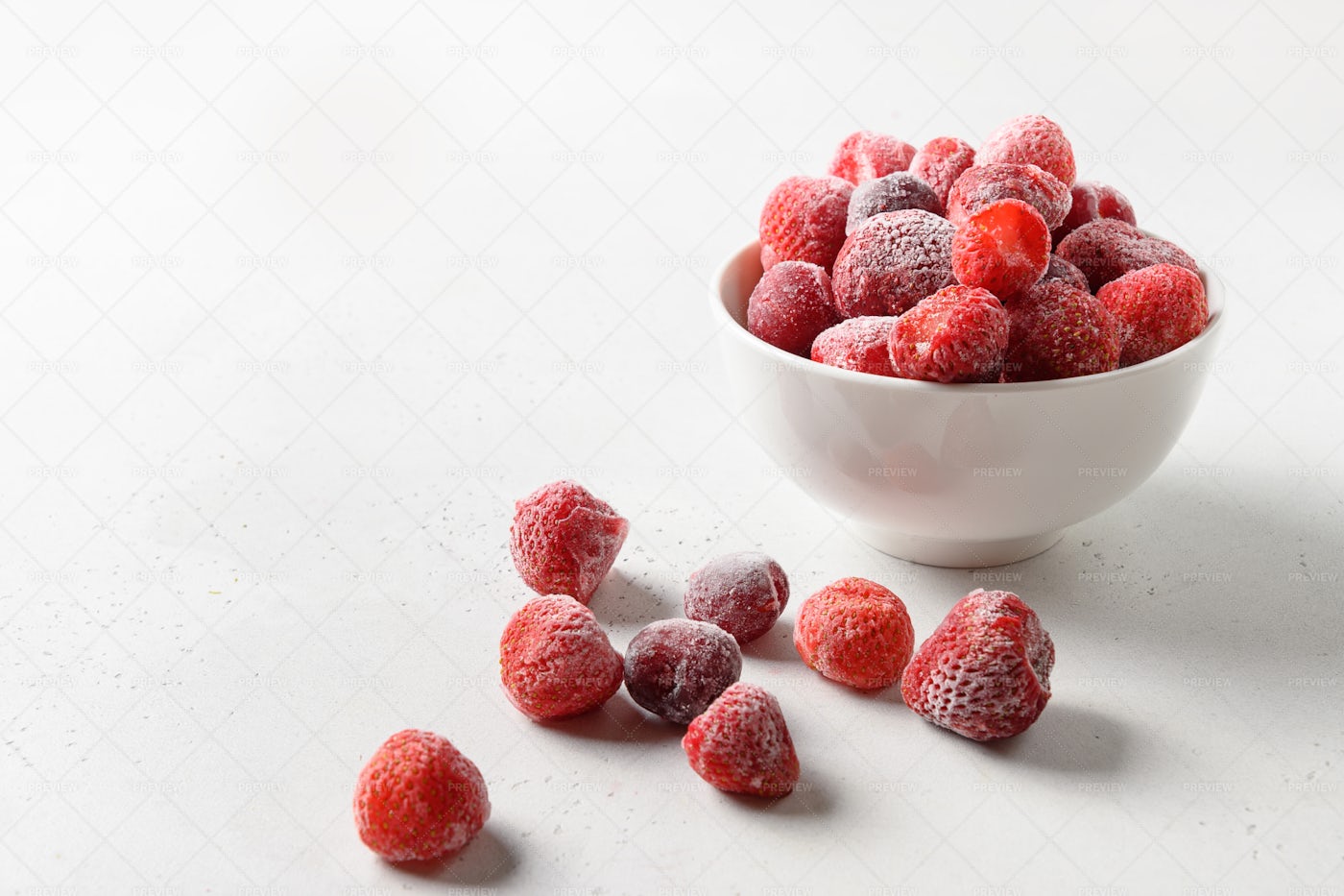 Bowl Of Frozen Strawberries: Stock Photos