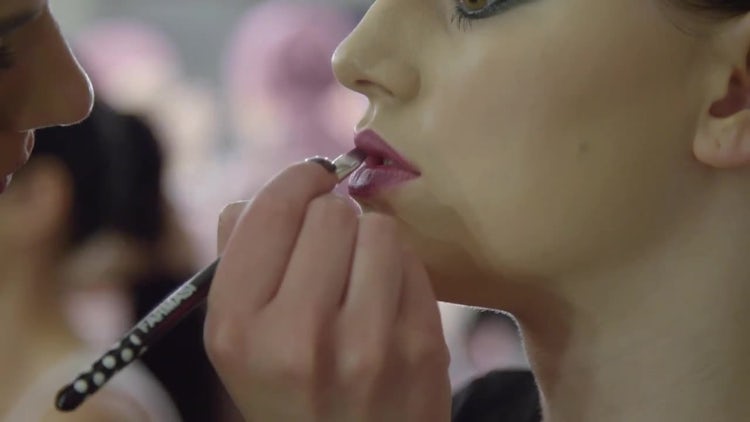 Makeup Artist Applying Lipstick : Stock Video