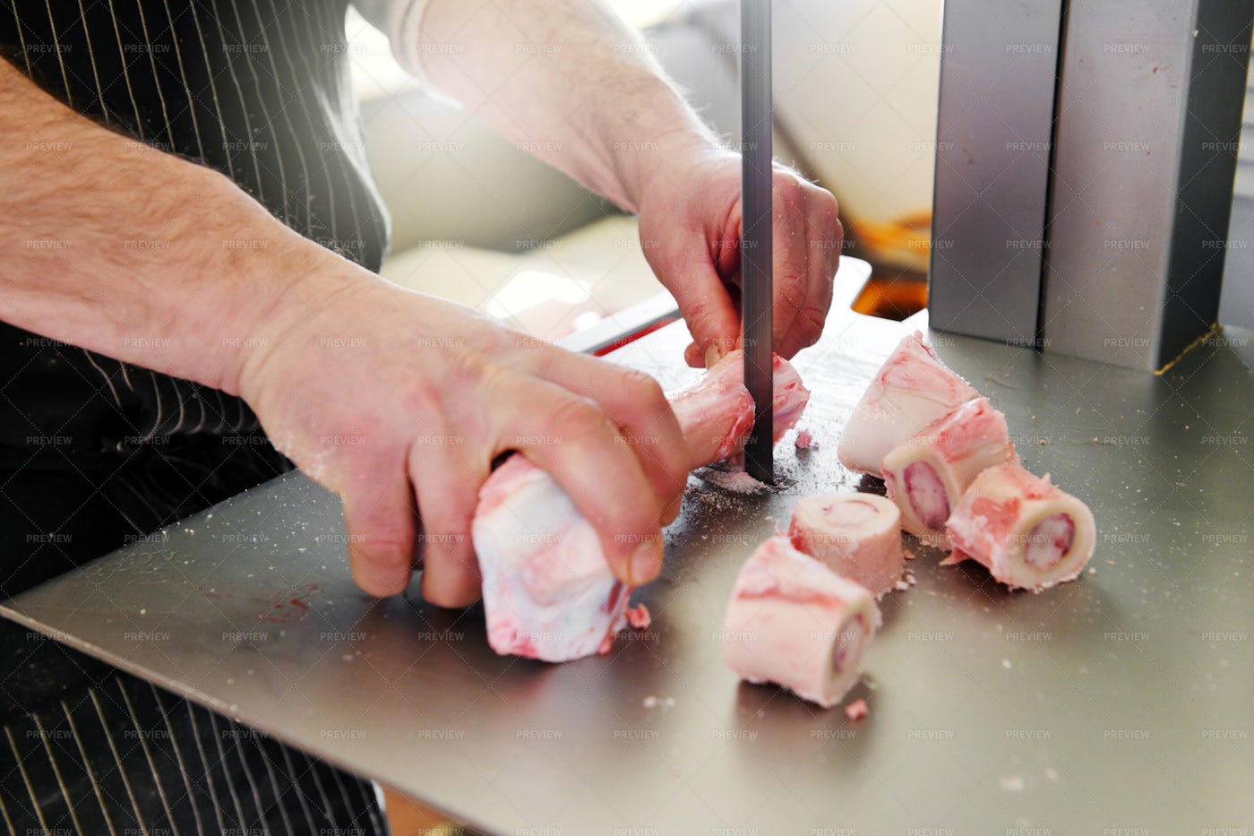 Sawing Marrow Bones: Stock Photos