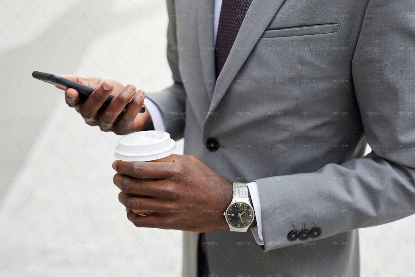 Doing Business From His Phone: Stock Photos
