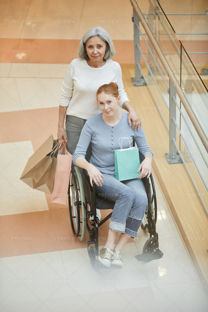 Shopping With Her Disabled Daughter: Stock Photos