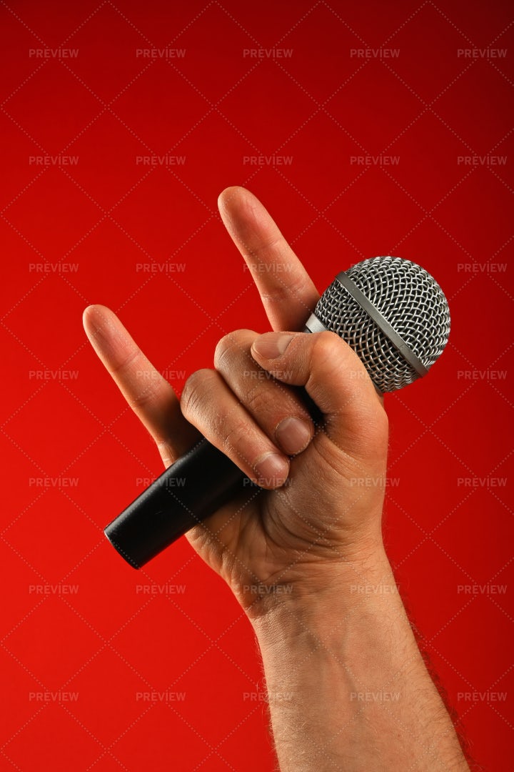 Hand With Microphone: Stock Photos