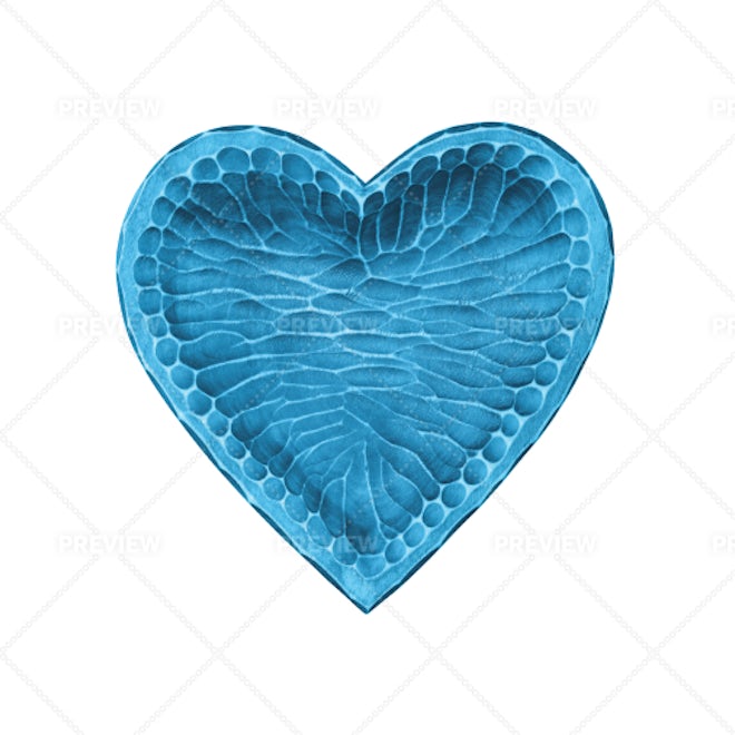 Patterns And Designs Of Green Wooden Heart On Blue Background With