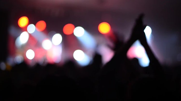 Defocused Stage And Fans Dancing: Stock Video