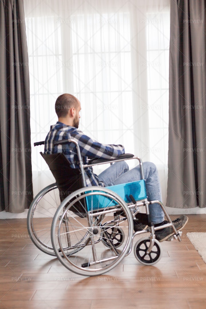 Disabled Man Looking Outside: Stock Photos