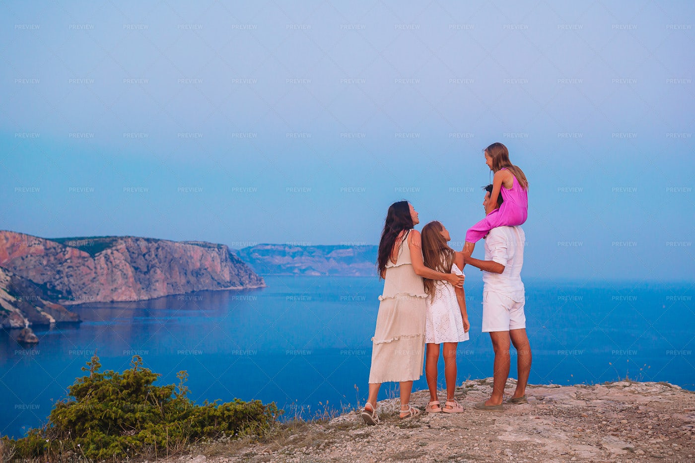 Family On The Mountain Edge: Stock Photos