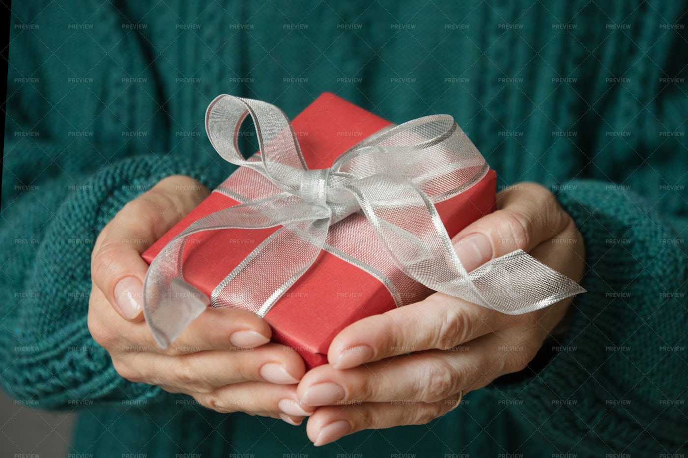 Holding Red Gift: Stock Photos
