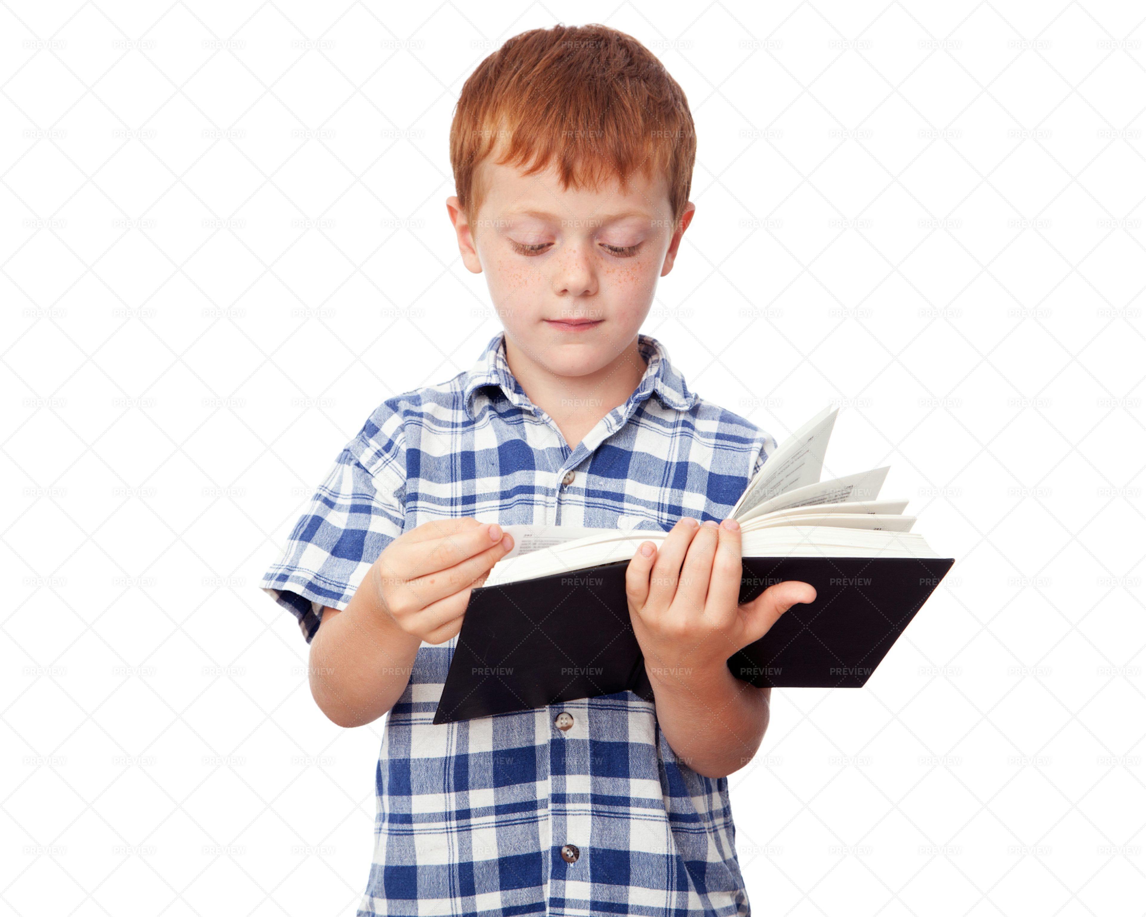 Boy Reading A Book - Stock Photos | Motion Array