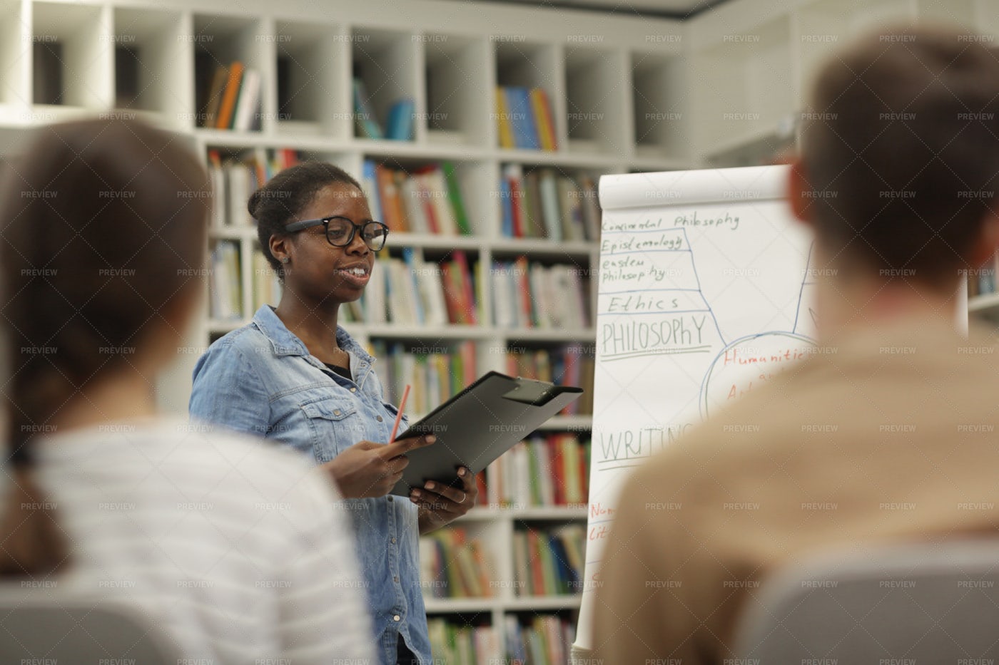 Woman Student Presenting: Stock Photos