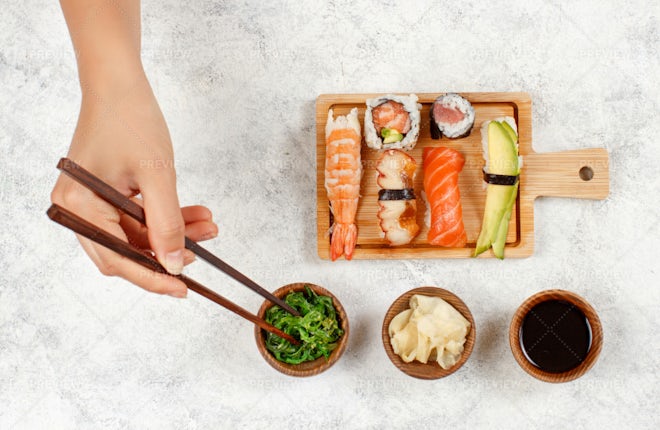 Various sushi sets top view Stock Photo by ©kamranaydinov 345408858