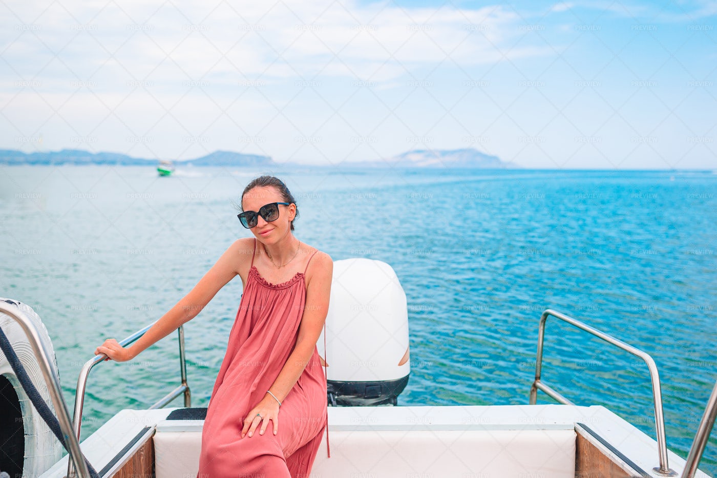 Woman Sailing On Boat: Stock Photos