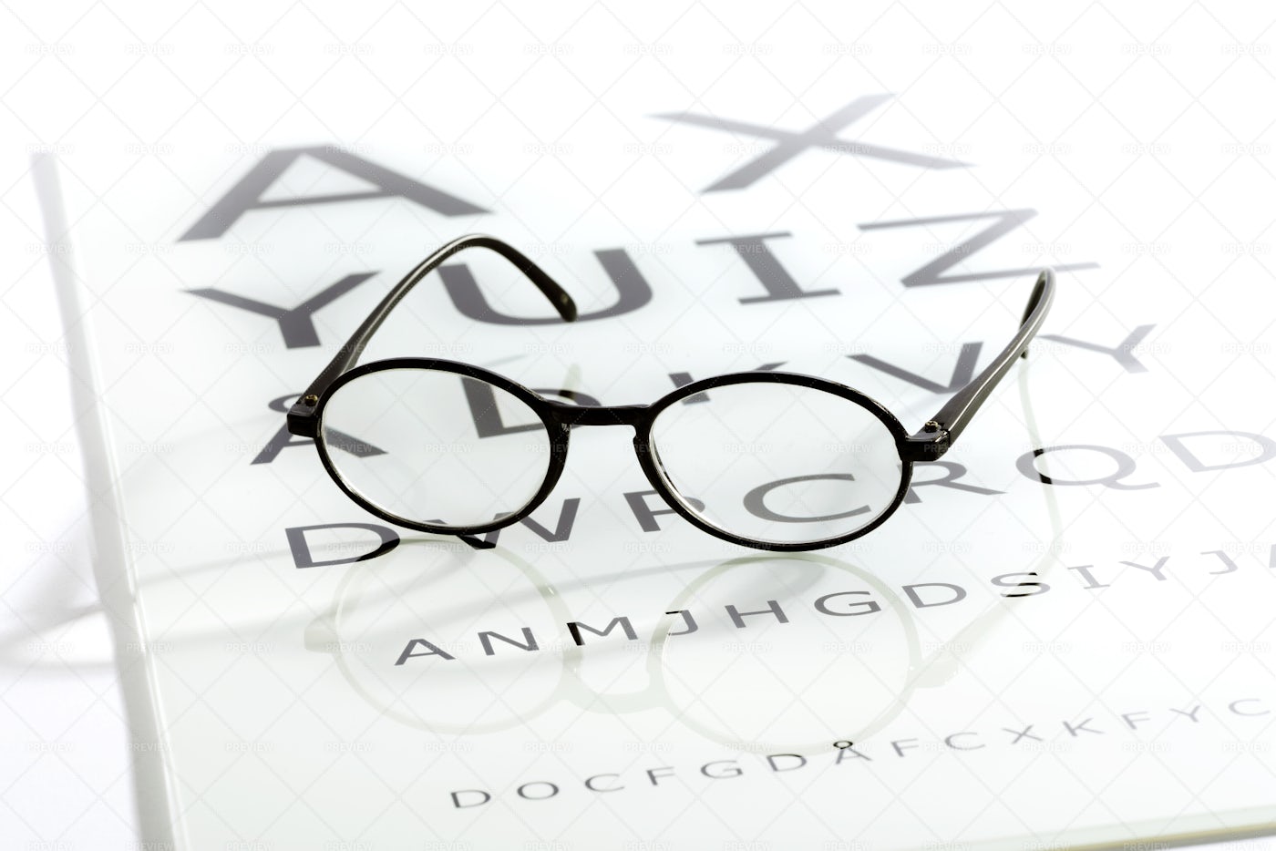 Glasses On A Chart Table: Stock Photos