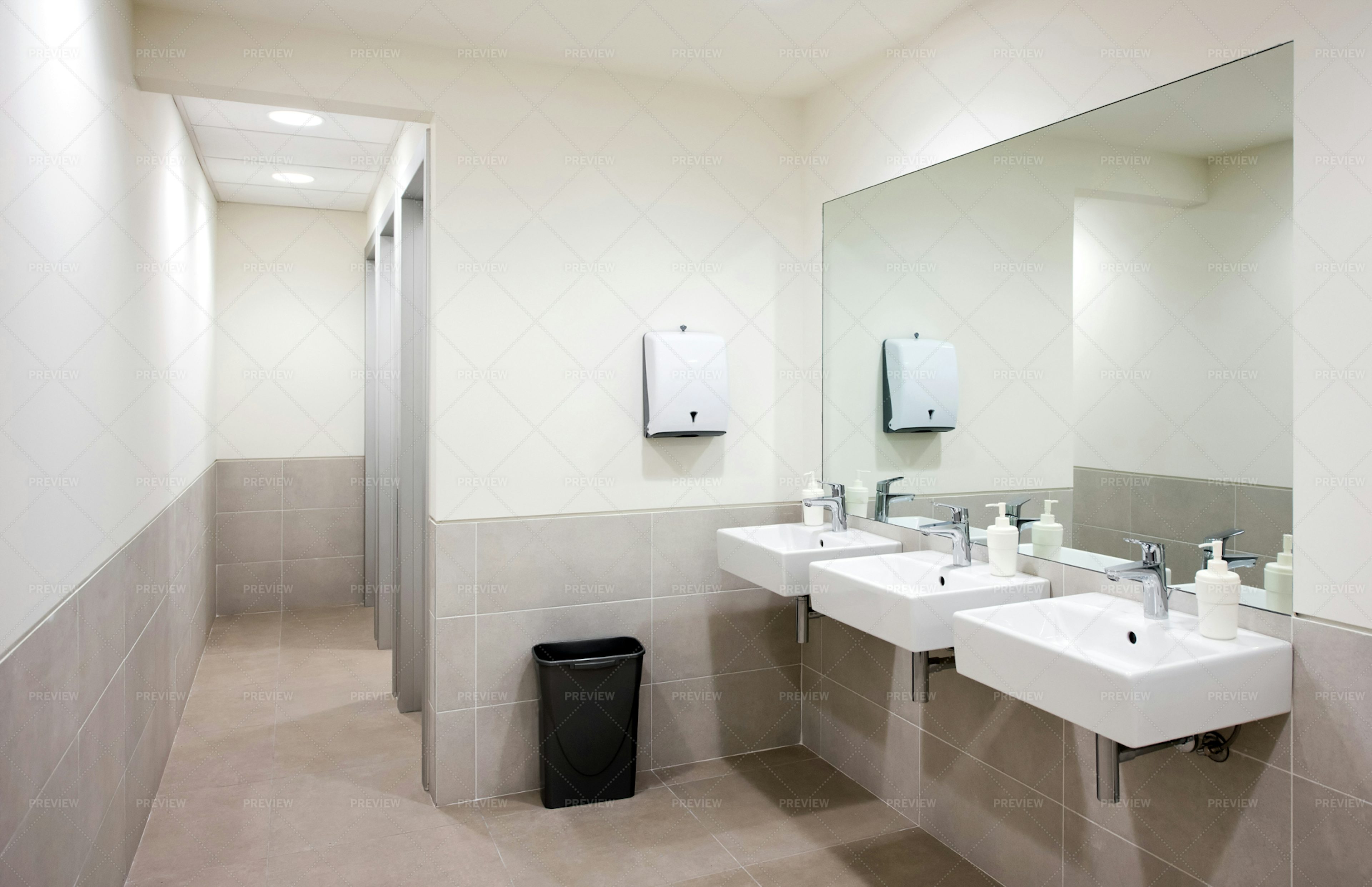 giant round sinks in public bathroom