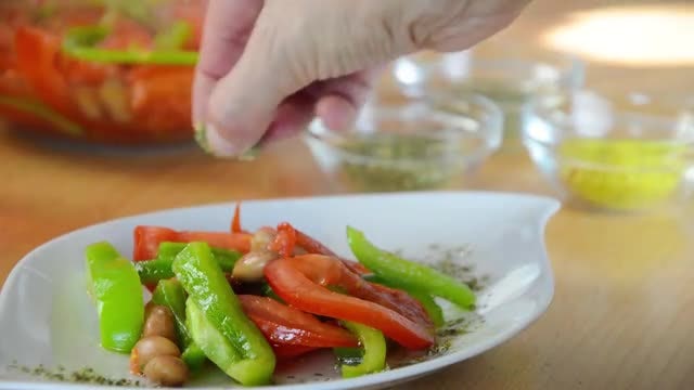 Adding Spice To Mixed Salad: Stock Video
