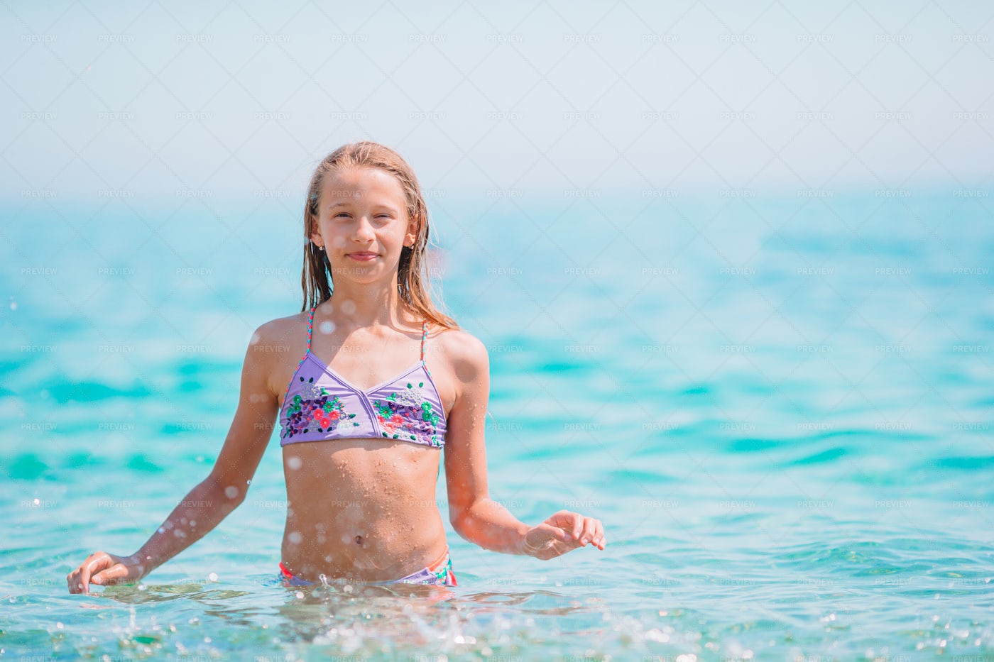 Girl Enjoying Water: Stock Photos