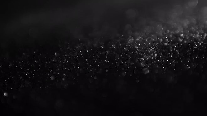 Dust Swirling On A Black Background - Stock Video | Motion Array