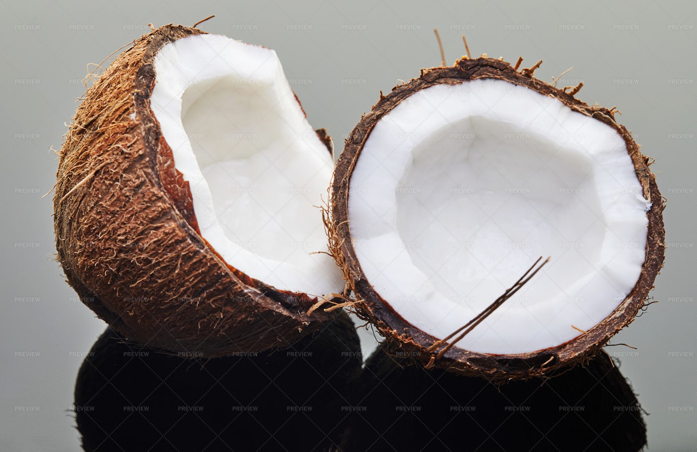 Coconut Chopped Into Two: Stock Photos