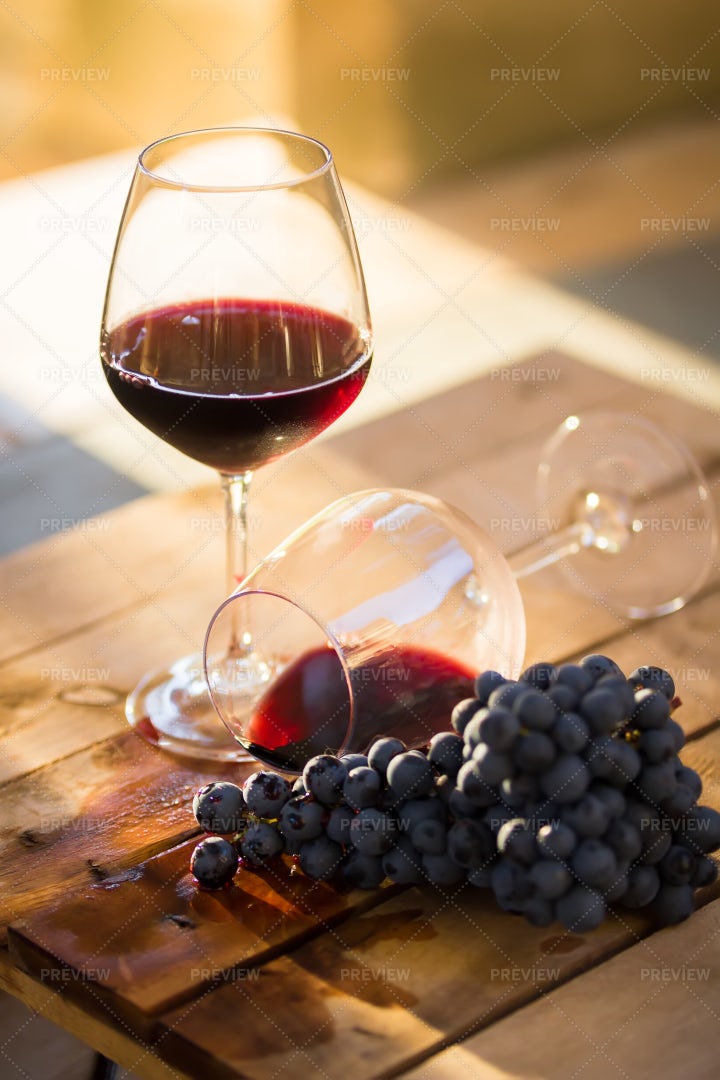 Spilled Red Wine And Grapes: Stock Photos