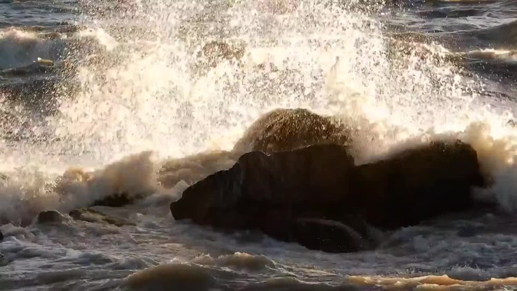 Waves Crashing Into A Rock : Stock Video